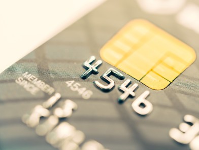 Close-up of Visa and Mastercard credit cards symbolizing financial power and control.